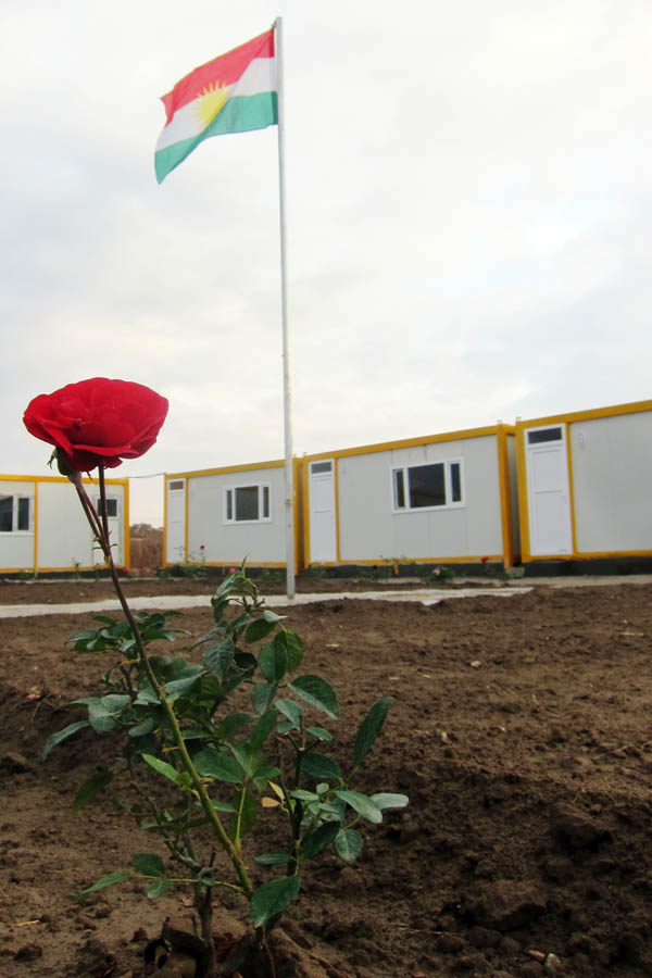 Preschool in Domiz Refugee Camp for Syrians, Iraq with Kurdistan flag